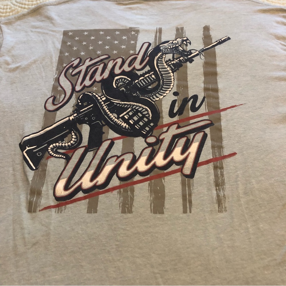 “Stand in Unity” Tee size Medium light  blue